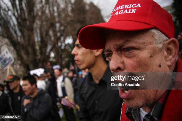 Supporter U.S. President Donald Trump shouts at anti-Trump protestors after violence broke out during a free speech rally in Berkeley, United States...