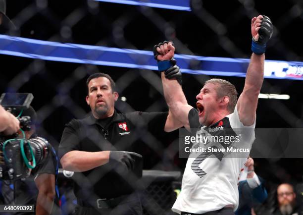 Daniel Kelly of Australia reacts is he is declared the winner by split decision after a middleweight bout against Rashad Evans during UFC 209 at...