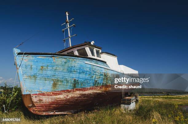 fishing village wharf - abandoned boat stock pictures, royalty-free photos & images