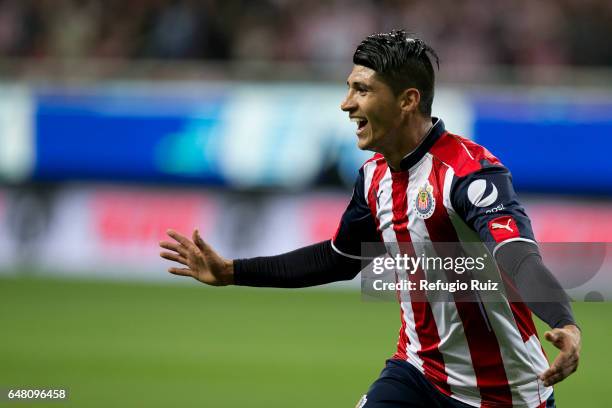 Alan Pulido of Chivas celebrates after scoring his team's second goal during the 9th round match between Chivas and Toluca as part of the Torneo...