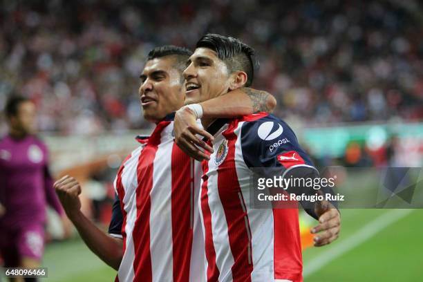 Alan Pulido of Chivas celebrates after scoring his team's second goal during the 9th round match between Chivas and Toluca as part of the Torneo...