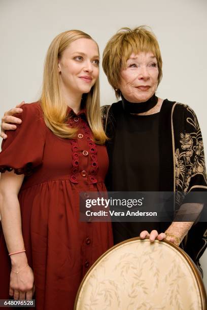 Amanda Seyfried and Shirley MacLaine at "The Last Word" press conference at the Four Seasons Hotel on March 3, 2017 in Beverly Hills, California.