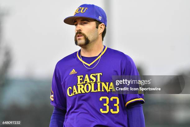 East Carolina pitcher Jacob Wolfe between pitches in a game between the St. John"s Red Storm and the East Carolina Pirates during the Keith LeClair...