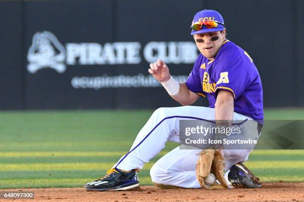 East Carolina infielder Charlie Yorgen fields a ground ball in a game between the St. John"s Red Storm and the East Carolina Pirates during the Keith...