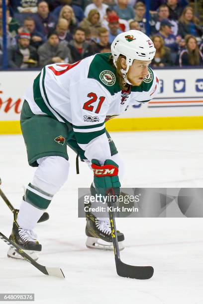 Ryan White of the Minnesota Wild lines up for a face-off during the game against the Columbus Blue Jackets on March 2, 2017 at Nationwide Arena in...