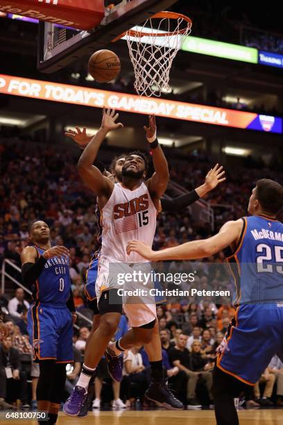 Alan Williams of the Phoenix Suns attempts a shot against the Oklahoma City Thunder during the second half of the NBA game at Talking Stick Resort...
