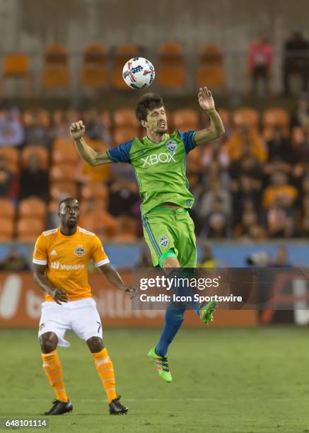 Seattle Sounders midfielder Alvaro Fernandez goes up for a header during the MLS opening match between the Seattle Sounders and Houston Dynamo on...