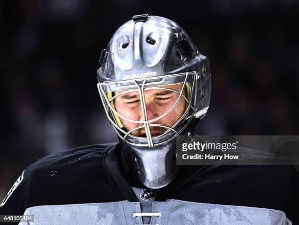 Ben Bishop of the Los Angeles Kings reacts during a stop in play with his team trailing 4-2 to the Vancouver Canucks during the third period at...