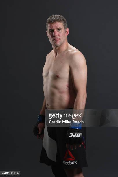Daniel Kelly of Australia poses for a portrait backstage after his victory over Rashad Evans during the UFC 209 event at T-Mobile Arena on March 4,...