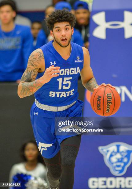 Georgia State's D'marcus Simonds brings the ball up court against Georgia Southern in a Sun Belt Conference basketball game at the GSU Sports Arena...