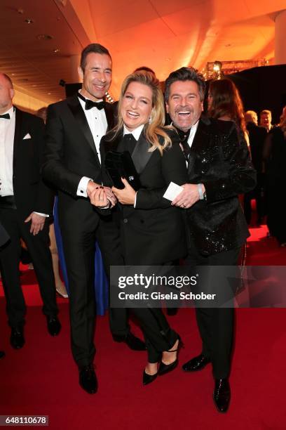 Kai Pflaume, Thomas Anders and his wife Claudia Anders during the Goldene Kamera reception at Messe Hamburg on March 4, 2017 in Hamburg, Germany.