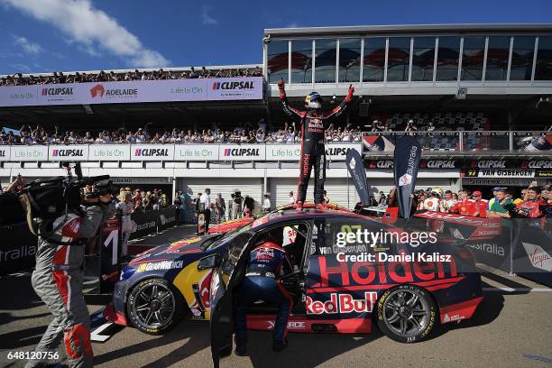 Shane Van Gisbergen driver of the Red Bull Holden Racing Team Holden Commodore VF celebrates after winning race 2 for the Clipsal 500, which is part...