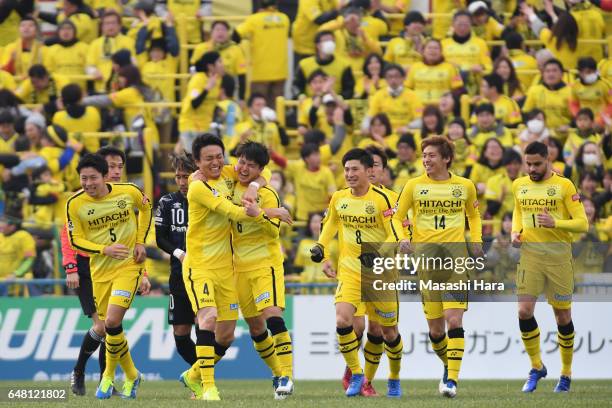 Yusuke Kobayashi of Kashiwa Reysol celebrates scoring his side's first goal with his team mates during the J.League J1 match between Kashiwa Reysol...