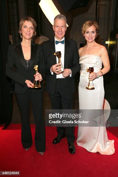 Marietta Slomka, Peter Kloeppel and Caren Miosga with award during the Goldene Kamera after show party at Messe Hamburg on March 4, 2017 in Hamburg,...