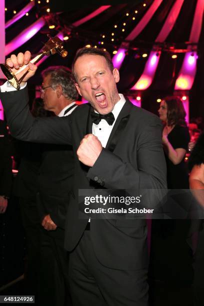 Wotan Wilke Moehring with award during the Goldene Kamera after show party at Messe Hamburg on March 4, 2017 in Hamburg, Germany.