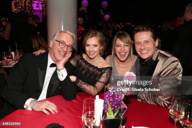 Christoph M. Ohrt and his girlfriend Dana Golombek, Roman Knizka and his wife Stefanie Mensing during the Goldene Kamera after show party at Messe...