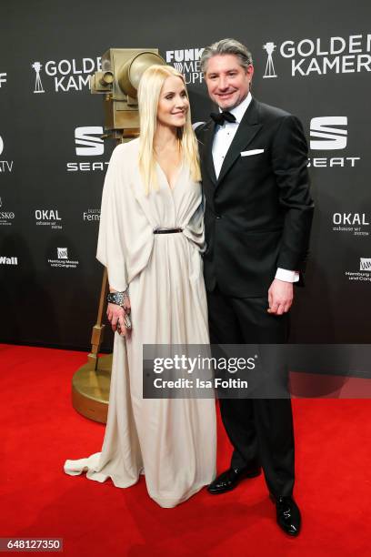 German news anchor Judith Rakers and her husband Andreas Pfaff arrive for the Goldene Kamera on March 4, 2017 in Hamburg, Germany.