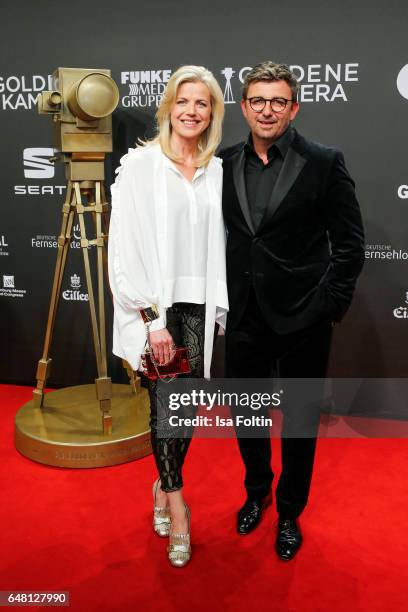 German actor Hans Sigl and his wife Susanne Sigl arrive for the Goldene Kamera on March 4, 2017 in Hamburg, Germany.