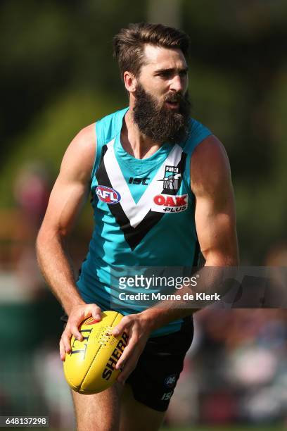 Justin Westhoff of the Power runs with the ball during the 2017 JLT Community Series AFL match between the Port Adelaide Power and the Richmond...