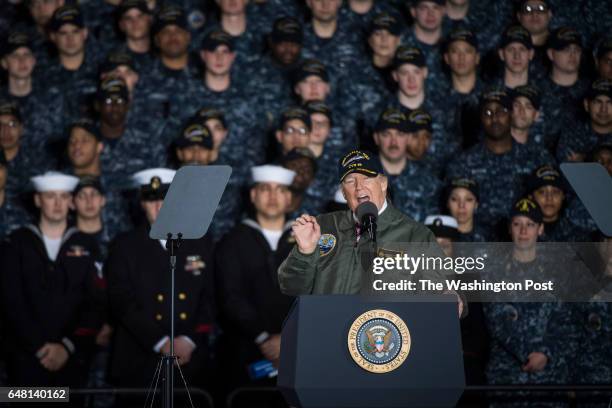 President Donald Trump speaks to Navy and shipyard personnel aboard nuclear aircraft carrier Gerald R. Ford at Newport News Shipbuilding in Newport...