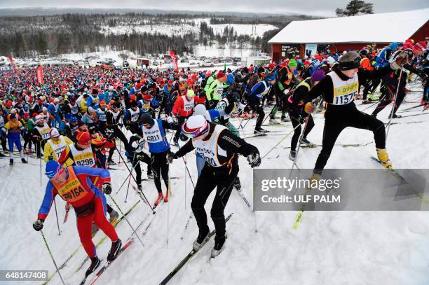 Competitors take the start of the long distance cross country ski competition Vasloppet in Salen, on March 5, 2017. Vasaloppet is 90 kilometers from...