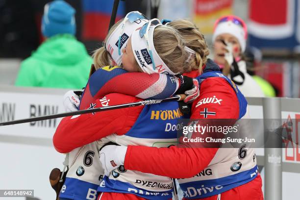 Kaia Woeien Nicolaisen, Hilde Fenne, Tiril Eckhoff and Marte Olsbu of Norway celebrate after the Women's 4x6km relay during the BMW IBU World Cup...