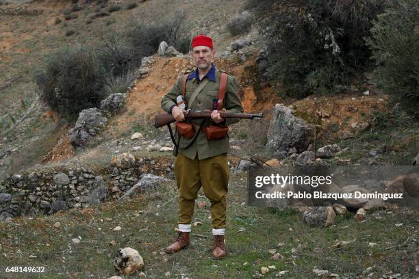 Historical re-enactor Gonzalo Luna dressed as Franco's troop Falange Morocco Batallion poses for a portrait before a re-enactment of the Battle of...