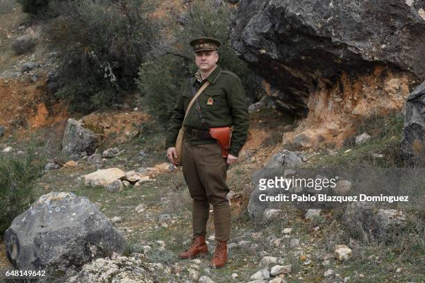 Historical re-enactor Aitor Minambres dressed as a Republican officer poses for a portrait before a re-enactment of the Battle of Jarama to mark its...