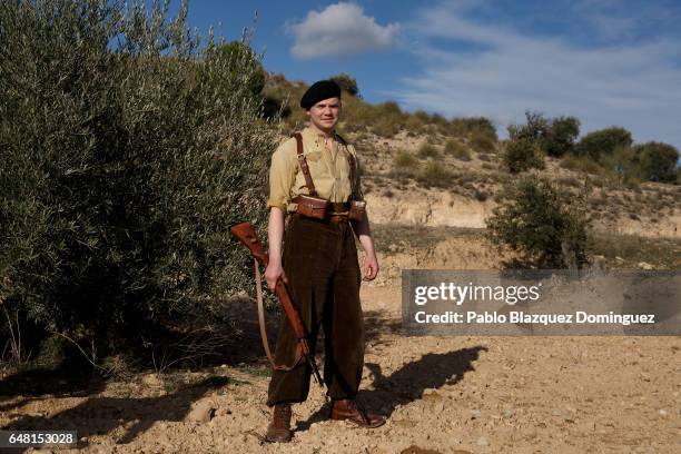 Historical re-enactor Jamie Delaney from United Kingdom dressed as a member of the British Batallion of the International Brigades poses for a...