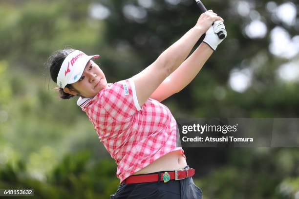 Fumika Kawagishi of Japan hits her tee shot on the 12th hole during the final round of the Daikin Orchid Ladies Golf Tournament at the Ryukyu Golf...