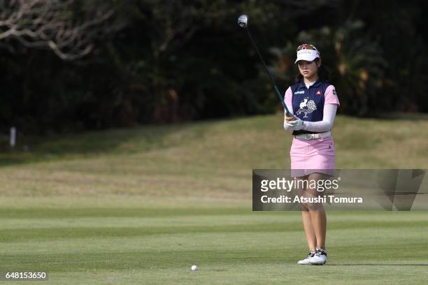 Yuting Seki of China hits her second shot on the 11th hole during the final round of the Daikin Orchid Ladies Golf Tournament at the Ryukyu Golf Club...