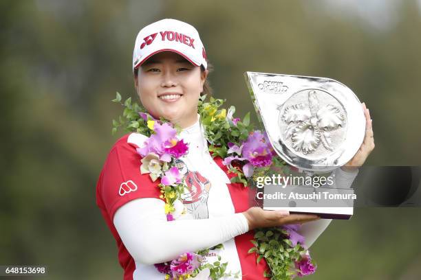 Sun-Ju Ahn of South Korea poses with the trophy after winning the Daikin Orchid Ladies Golf Tournament at the Ryukyu Golf Club on March 5, 2017 in...