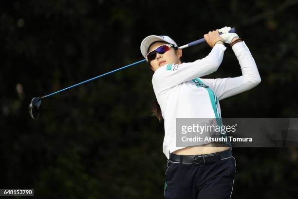 Rie Tsuji of Japan hits her tee shot on the 11th hole during the final round of the Daikin Orchid Ladies Golf Tournament at the Ryukyu Golf Club on...