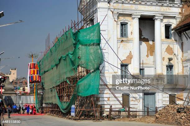 Ceremonial Bamboo Log known as &quot;Chir&quot; along with the vibrant cloth strips erected, which representing good luck charms, on the first day of...