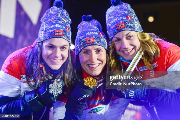 Heidi Weng, Marit Bjoergen and Astrid Uhrenholdt Jacobsen, all from Norway, at the Award Ceremony of Ladies cross-country 30 km Mass Start Free...