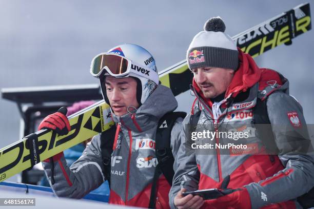 Kamil Stoch and Adam Malysz from Poland during Men Large Hill Team final in ski jumping, at FIS Nordic World Ski Championship 2017 in Lahti. On...