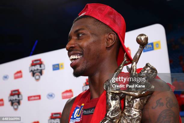 Casey Prather of the Wildcats looks on with the trophy after winning game three and the NBL Grand Final series between the Perth Wildcats and the...