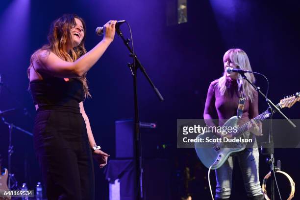 Singers Bethany Cosentino of Best Coast, Liz Phair and Bobb Bruno perform onstage during the "Don't Site Down: Planned Parenthood Benefit Concert" at...