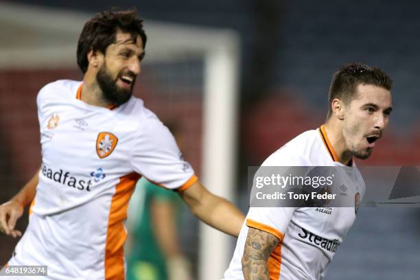 Jamie Maclaren and Thomas Broich of the Roar celebrate a goal during the round 22 A-League match between the Newcastle Jets and the Brisbane Roar at...