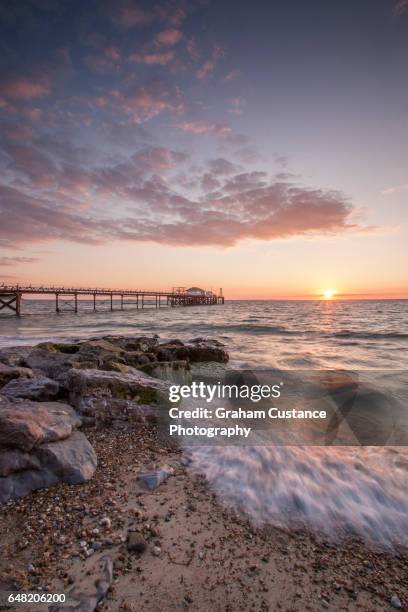 totland bay sunset, isle of wight - totland bay stock pictures, royalty-free photos & images