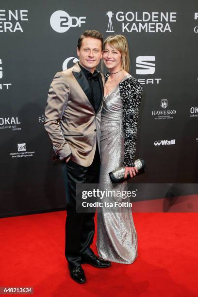 German actor Roman Knizka and his wife Stefanie Mensing arrive for the Goldene Kamera on March 4, 2017 in Hamburg, Germany.