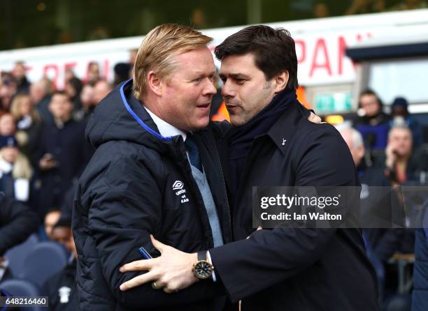 Mauricio Pochettino, Manager of Tottenham Hotspur and Ronald Koeman, Manager of Everton shake hands during the Premier League match between Tottenham...