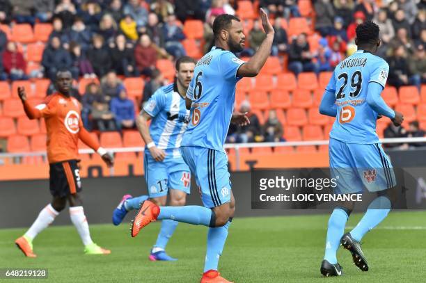 Marseille's Portuguese defender Rolando Jorge Pires Da Fonseca celebrates with teammates after scoring a goal during the French L1 football match FC...