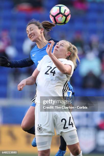 Gaetane Thiney of France and Kristin Demann of Germany challenge for the ball during the France Vs Germany SheBelieves Cup International match at Red...