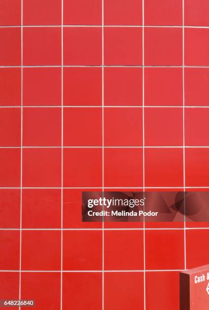 red tile on retail building - red tile stock pictures, royalty-free photos & images