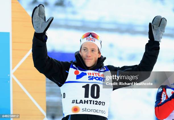 Andrew Musgrave of Great Britain poses for the media after finishing fourth in the Men's Cross Country Mass Start during the FIS Nordic World Ski...