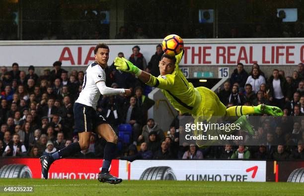 Dele Alli of Tottenham Hotspur scores his sides third goal during the Premier League match between Tottenham Hotspur and Everton at White Hart Lane...