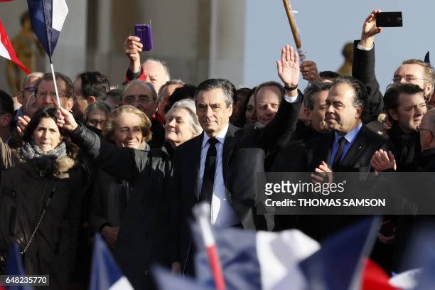 French presidential election candidate for the right-wing Les Republicains party Francois Fillon , flanked by his wife Penelope Fillon , his daughter...