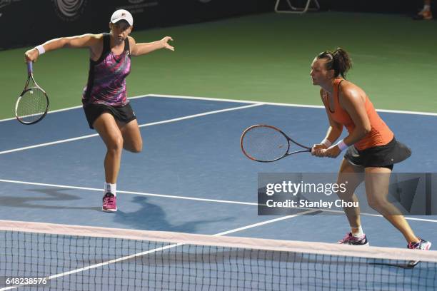 Ashleigh Barty and Casey Dellacqua of Australia in actions in the Doubles Final during the 2017 WTA Malaysian Open at the TPC on March 5, 2017 in...