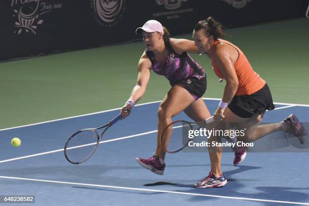 Ashleigh Barty and Casey Dellacqua of Australia in actions in the Doubles Final during the 2017 WTA Malaysian Open at the TPC on March 5, 2017 in...